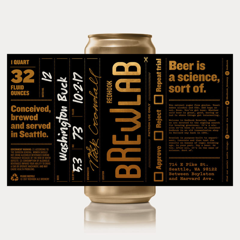 A gold beer can with the black and gold designed Brewlab label on a white background. The label is fully rolled out as an image so you can see all the design elements and text that appears on the label. The label is black and the text is gold and white.